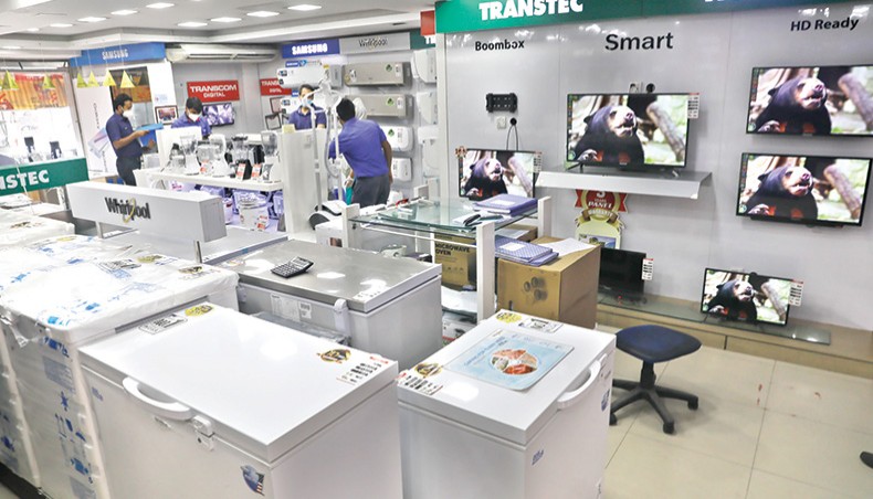 A file photo shows the inside of a showroom of electronics products in capital Dhaka. The government may offer tax holiday facility to home appliance makers for 10 years in the national budget for the forthcoming fiscal year 2021-2022 to attract investments and facilitate import-substitute local industry in the country. — New Age photo