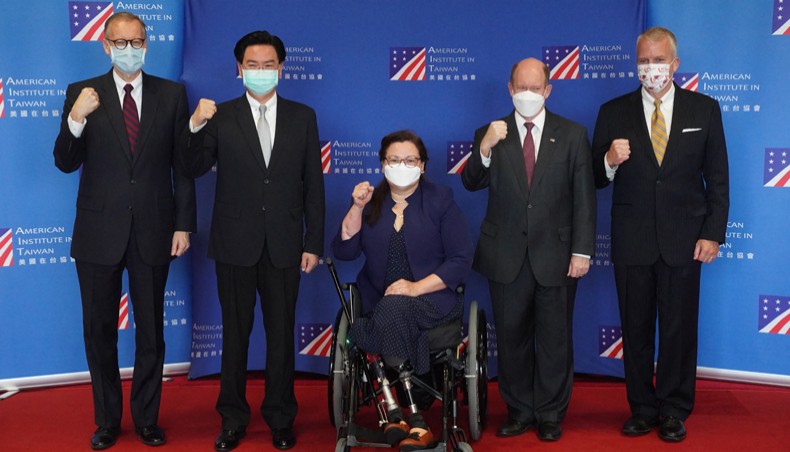 A delegation comprised of Senators Tammy Duckworth (C), Christoper Coons (2nd R) and Dan Sullivan (R) pose for photographs with Taiwan’s Foreign Minister Joseph Wu (2nd L) and American Institute in Taiwan (AIT) Director Brent Christensen (L) following their arrival at the Songshan Airport in Taipei on June 6, 2021. – AFP photo