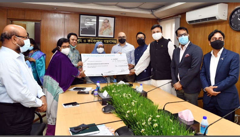 Grameenphone authorities donate around Tk 31.4 crore to the Bangladesh Labour Welfare Foundation Fund under the Ministry of Labour and Employment on Tuesday. — Press Release