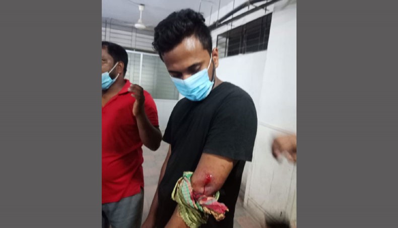 A bullet injured man undergoes treatment at the Chattogram Medical College Hospital after two groups of locals clashed over hanging a signboard at a local graveyard on Friday. — New Age Photo