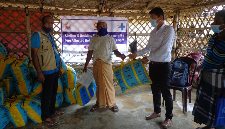 Faith in Action, a non-governmental organization, distributes relief materials at Rohingya Camp-9 under Ukhiya upazila in Cox’s Bazar on Thursday. – Press Release