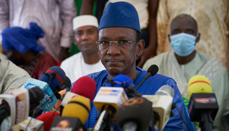 In this file photo taken on May 28, 2021 Choguel Maiga, leader of the coalition Mouvement du 5 Juin-Rassemblement des Forces Patriotiques, speaks to the press as the coalition proposed his candidature to the primature after that colonel Assimi Goita led a coup to overthrow the government. — AFP photo