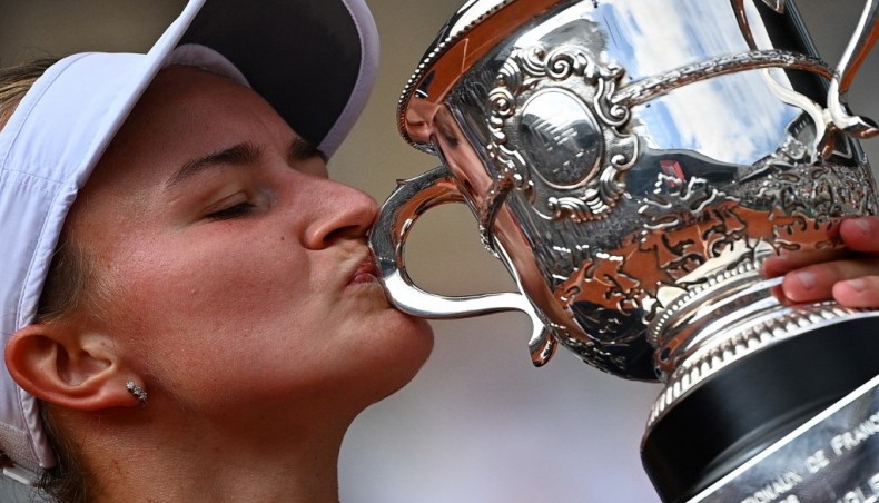 Czech Republic's Barbora Krejcikova kisses the trophy after defeating Russia's Anastasia Pavlyuchenkova in the French Open women’s singles final in Paris on Saturday. — AFP photo