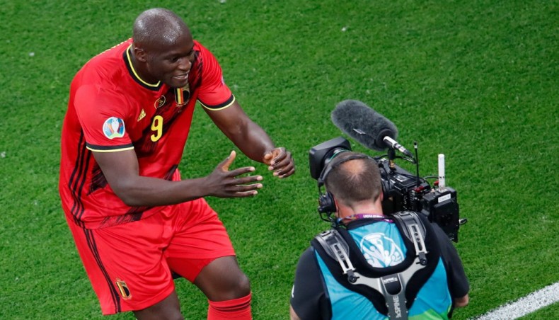 Belgium forward Romelu Lukaku (L) celebrates in front of a camera after scoring his team's first goal during their UEFA EURO 2020 match against Russia at the Saint Petersburg Stadium in Saint Petersburg on Saturday. — AFP photo