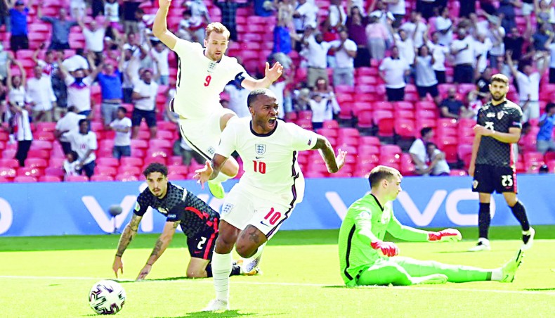 England forward Raheem Sterling (C) celebrates after scoring his team's first goal against Croatia during their Euro 2020 match at the Wembley Stadium in London on Sunday. — AFP photo