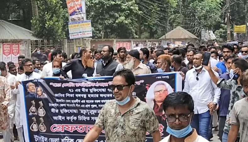 Ruling Awami League lawmaker for Tangail-2 constituency Tanvir Hasan leads a procession in Tangail town amid the ongoing government restrictions on public movement and gatherings to contain spread of Covid infection on Monday. — New Age Photo