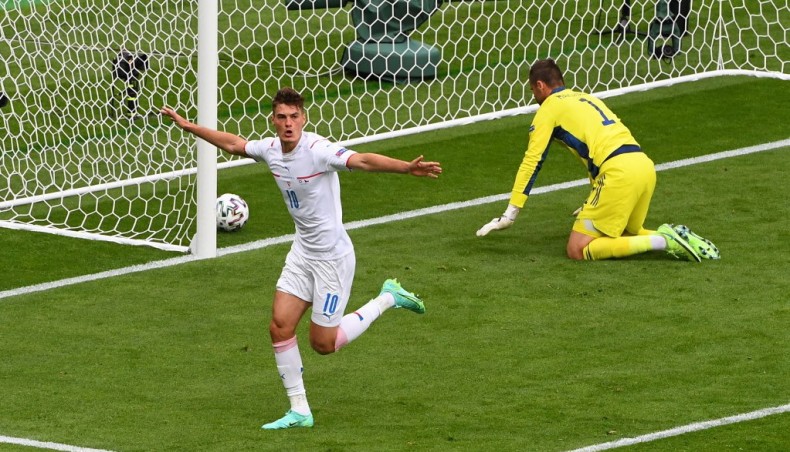 Czech Republic forward Patrik Schick (L) celebrates after scoring his team's first goal in Scotland during their UEFA EURO 2020 Group D match at Hampden Park in Glasgow on Monday. --- AFP photo