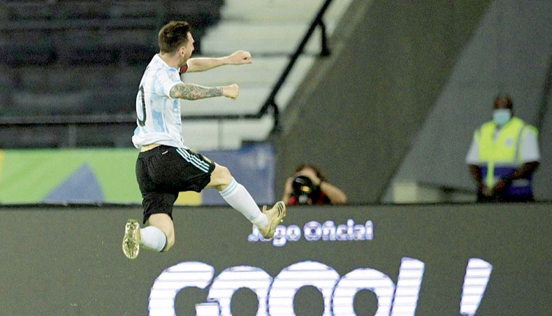 Argentina captain Lionel celebrates after scoring his team’s opening goal during their Copa America 2021 match against Chile at the Nilton Santos Stadium in Rio de Janeiro, Brazil on Monday. — AFP photo