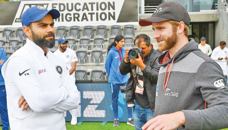 Indian captain Virat Kohli is seen with his New Zealand counterpart Kane Williamson. — AFP photo