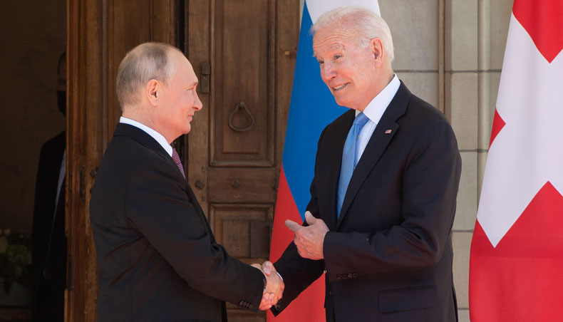 US president Joe Biden and Russian president Vladimir Putin shake hands as they arrive at Villa La Grange in Geneva, for the start of their summit on June 16, 2021. — AFP photo