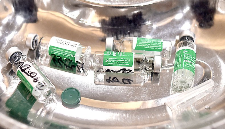 Vials of the Oxford-AstraZeneca Covid vaccine are pictured at the Bangabandhu Sheikh Mujib Medical University Hospital in Dhaka on June 22. — Agence France-Presse/Munir Uz Zaman