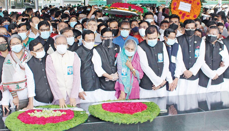 Awami League general secretary Obaidul Quader along with other party leaders places a floral wreath at the portrait of the country’s founding president Sheikh Mujibur Rahman at Dhanmondi 32 in Dhaka marking the 72nd founding anniversary of the Awami League on Wednesday. — New Age photo