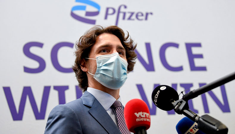 Canada’s prime minister Justin Trudeau talks to the press at the end of a visit with his Belgian counterpart of Europe’s largest Pfizer-BioNTech Covid-19 vaccine production site on June 15, 2021 in Puurs. — AFP photo