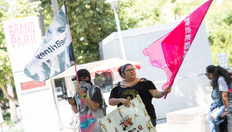 Fans and supporters of Britney Spears wave ‘Free Britney’ flags as they gather outside the Los Angeles County Courthouse during a scheduled hearing in the Britney Spears guardianship case, in Los Angeles, California, July 19, 2021. — AFP photo
