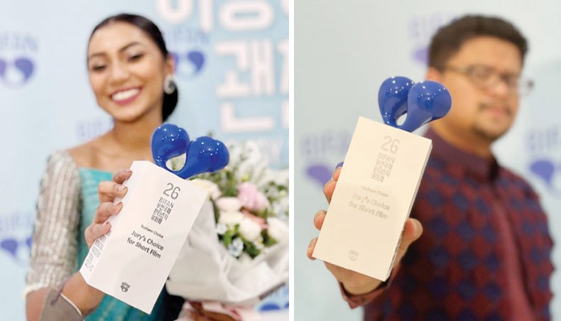 Sunerah Binte Kamal, left, and Nuhash Humayun pose with Jury’s Choice for Short Film Award at 26th Bucheon International Fantastic Film Festival in South Korea. — press release