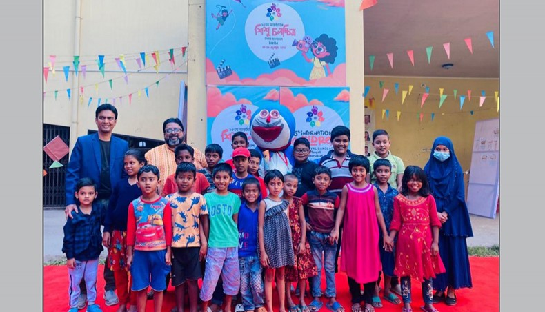 Dignitaries and children pose for a photo at the inaugural ceremony of three-day International Children’s Film Festival held at Zilla Shilpakala Academy, Tangail on Thursday. — Press release photo.