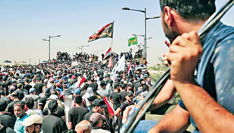 New Age | Iraq: Political crisis and solutions